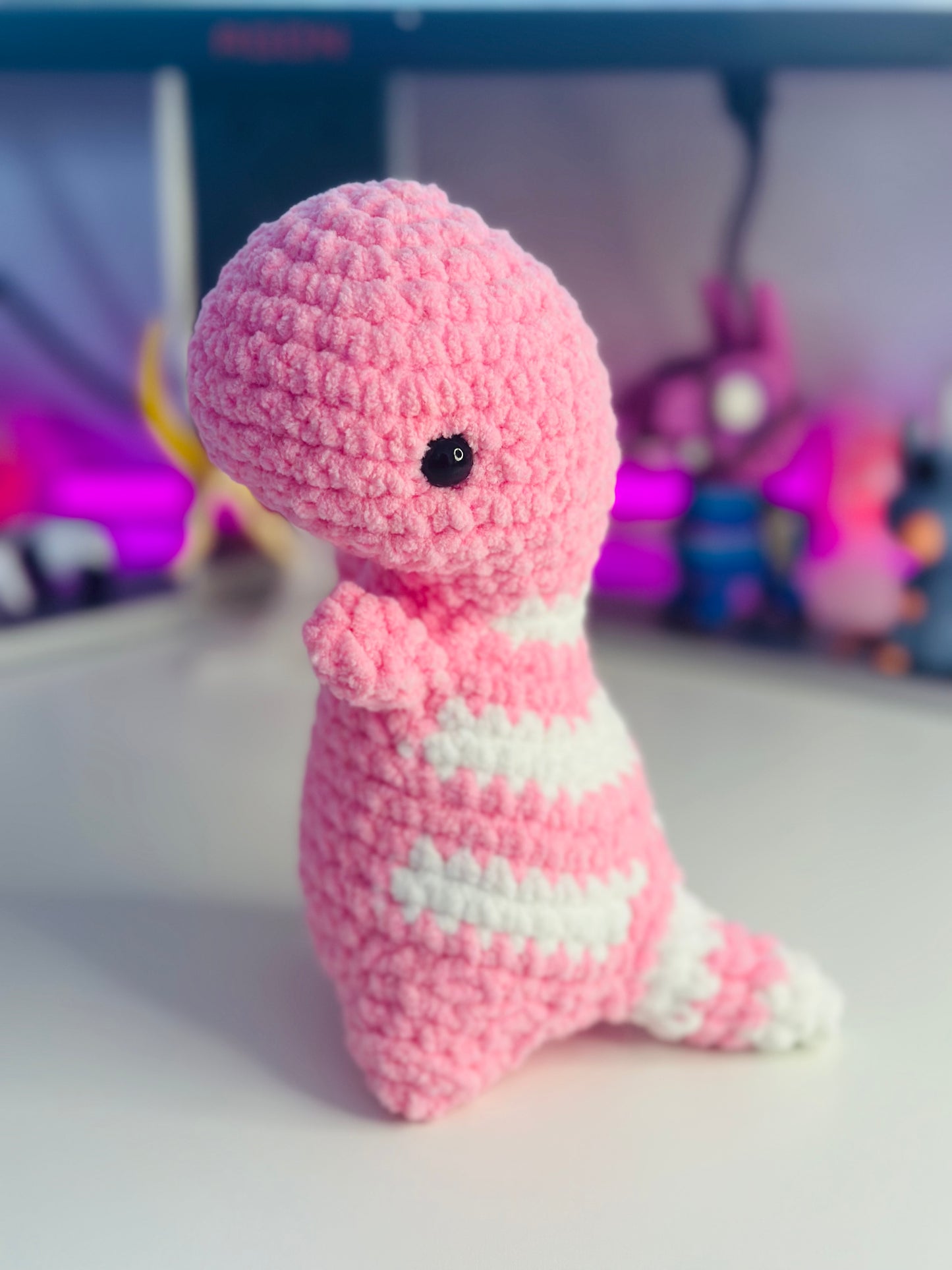 Petit dinosaure rose