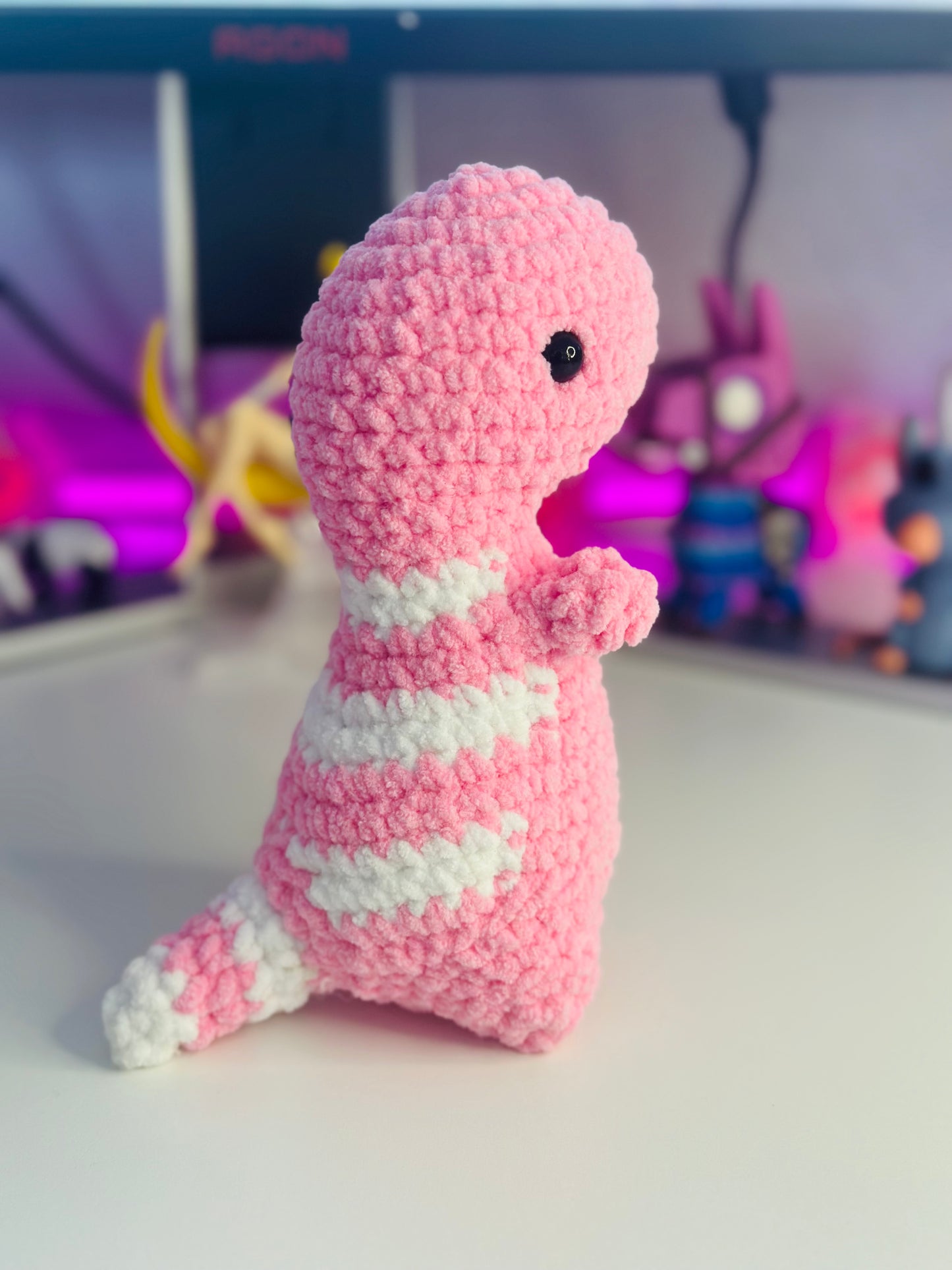 Petit dinosaure rose